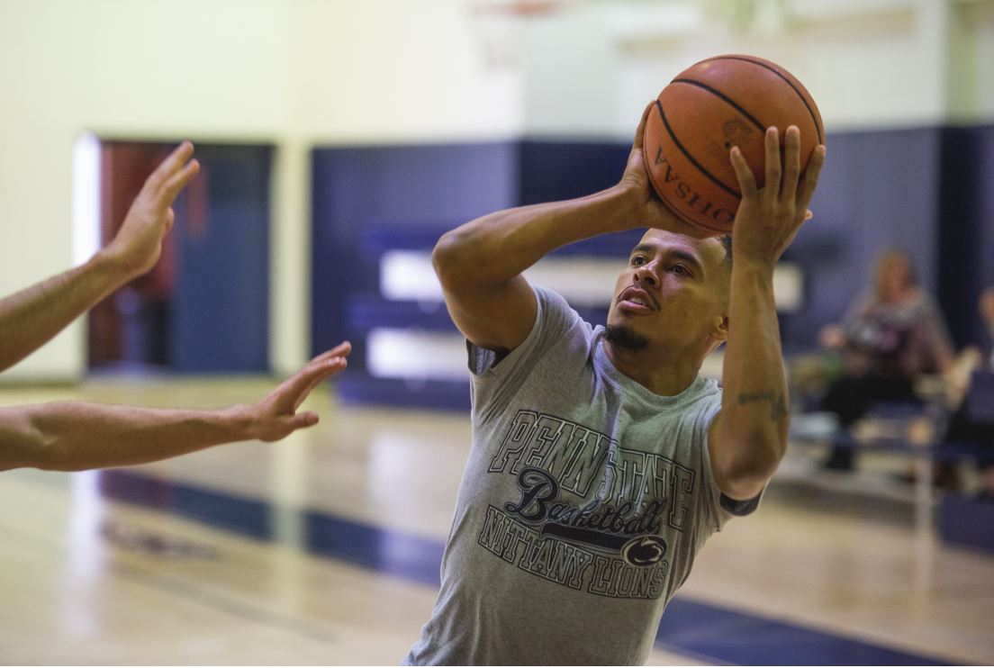 Student playing basketball at Penn State Shenango